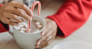 Photo by Julia Larson : https://www.pexels.com/photo/woman-with-cup-of-coffee-with-marshmallows-6113646/